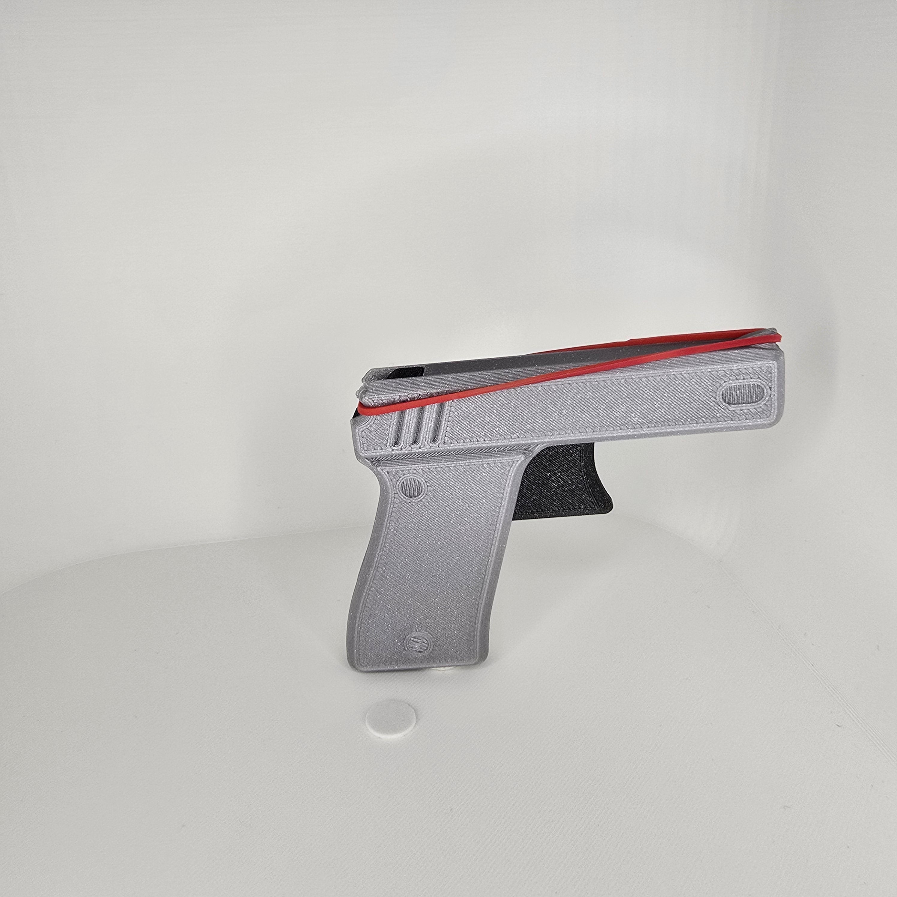 Pistolka na střílení gumiček